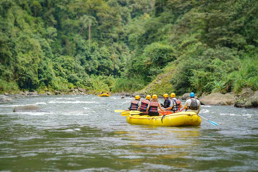 Rafters cruising down the Pacuare River in Costa Rica