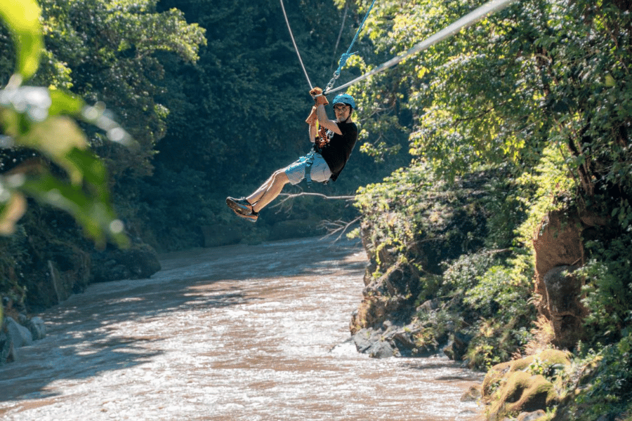 ziplining over the Pacuare River in the Costa Rican rainforest